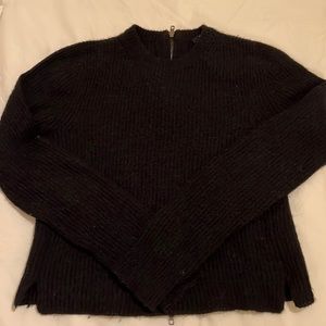 Black rubbed sweater with back zipper